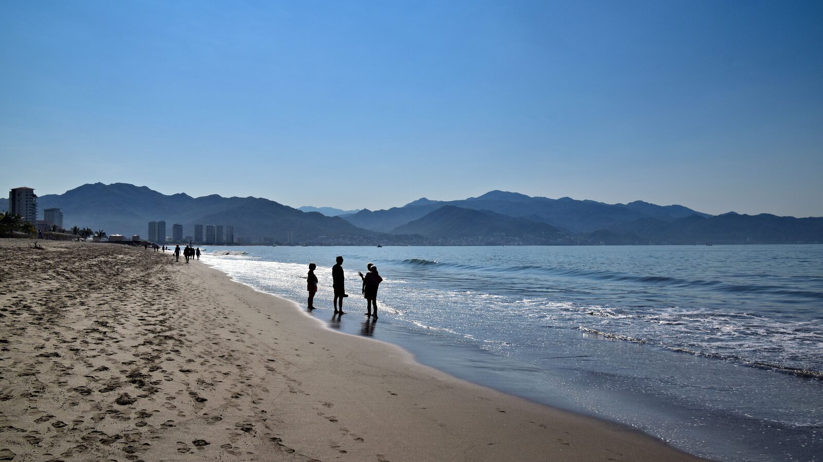 People walking along the beach in Puerto Vallarta