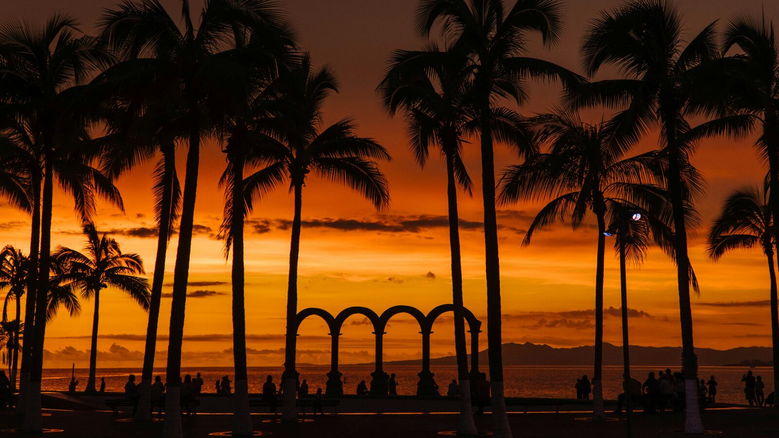 Sunset behind the arches on the Malecón, Puerto Vallarta