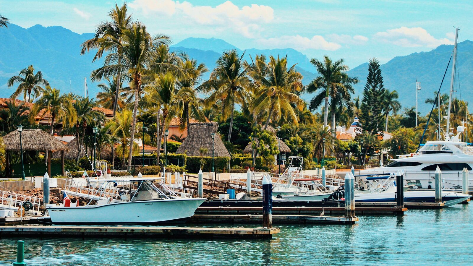 Boats moored in a marina on Banderas Bay