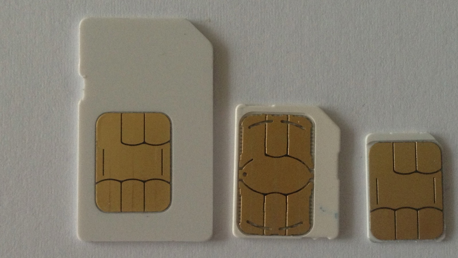 Three SIM card formats side by side